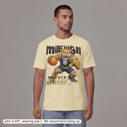 Man wearing a t-shirt with a graphic design of a bear holding a basketball and text.