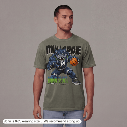 Man wearing a green t-shirt with a graphic design on a gray background