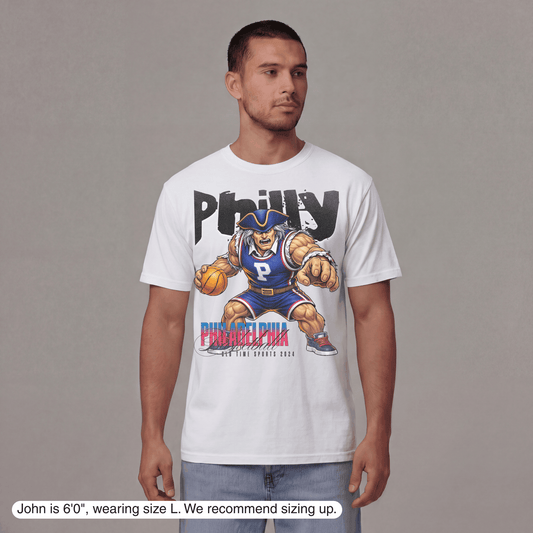 Man wearing a white t-shirt with a graphic design on a gray background