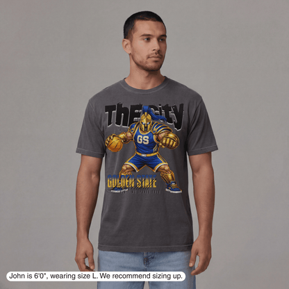 Man wearing a gray t-shirt with a graphic design on a gray background