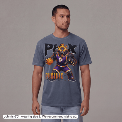 Man wearing a t-shirt with a graphic design on a gray background