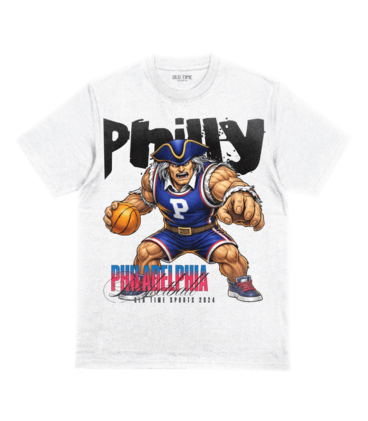 White t-shirt with a cartoon character holding a basketball and 'Philly' printed on it.