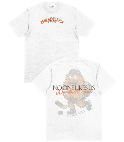 Two white t-shirts with hockey-themed designs on a white background