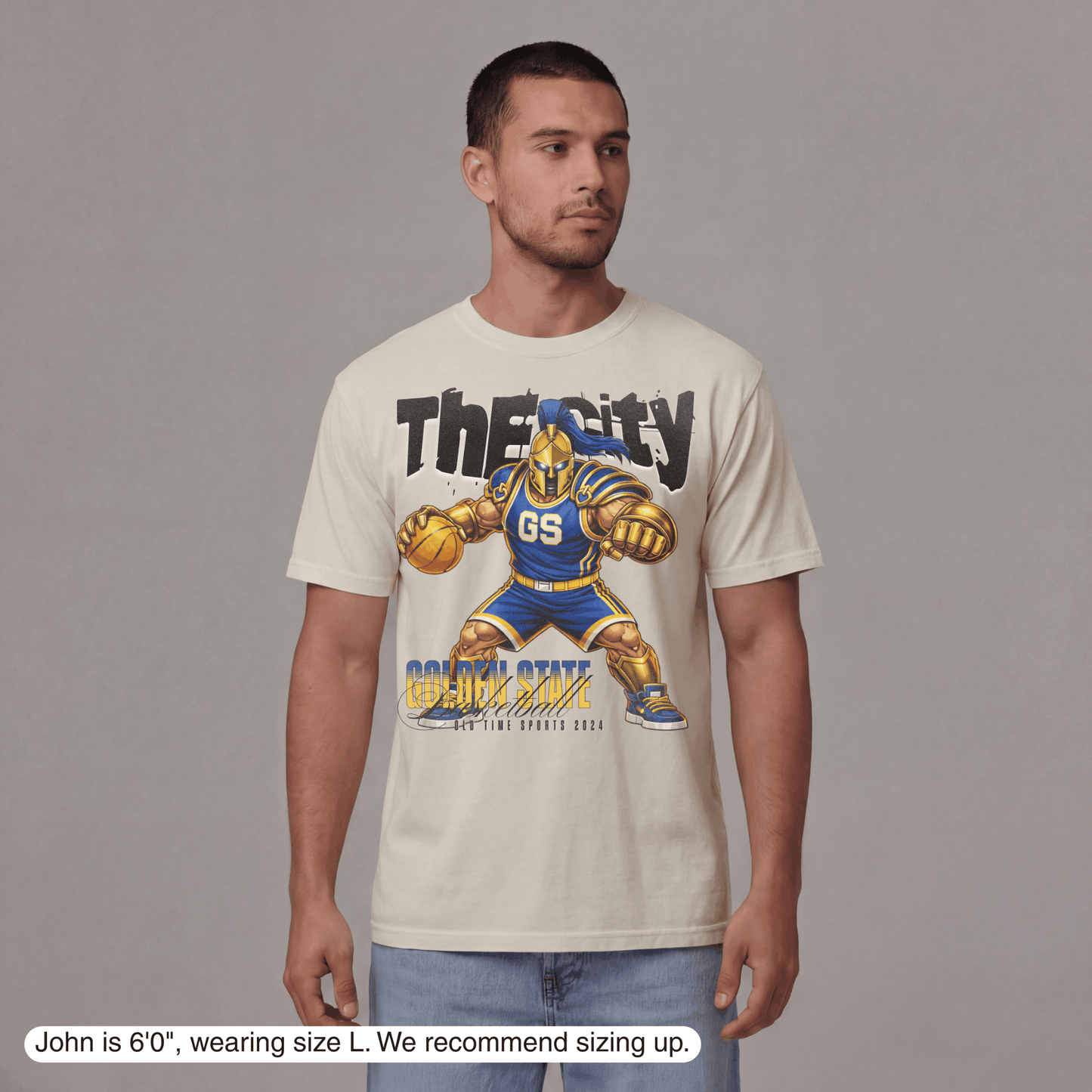 Man wearing a t-shirt with a graphic design of a basketball player and text on a gray background