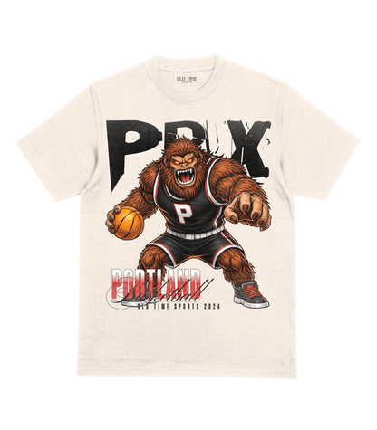 White t-shirt with a graphic of a bear holding a basketball and the word 'PRYX' on a green background
