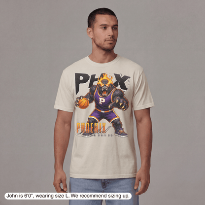 Man wearing a t-shirt with a graphic design of a phoenix basketball player on a gray background