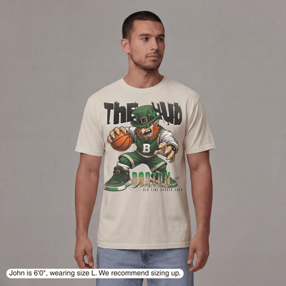 Man wearing a t-shirt with a graphic design of a leprechaun holding a basketball.