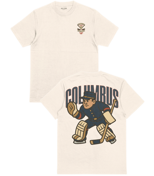 Beige t-shirt with a graphic of a hockey player and 'Columbus' text on a white background