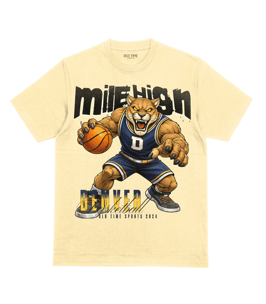 Beige t-shirt with a bear holding a basketball and 'mile high Denver' text on a green background