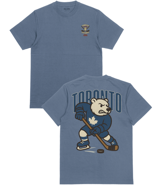 Blue t-shirt with hockey bear design and 'Toronto' text on a white background
